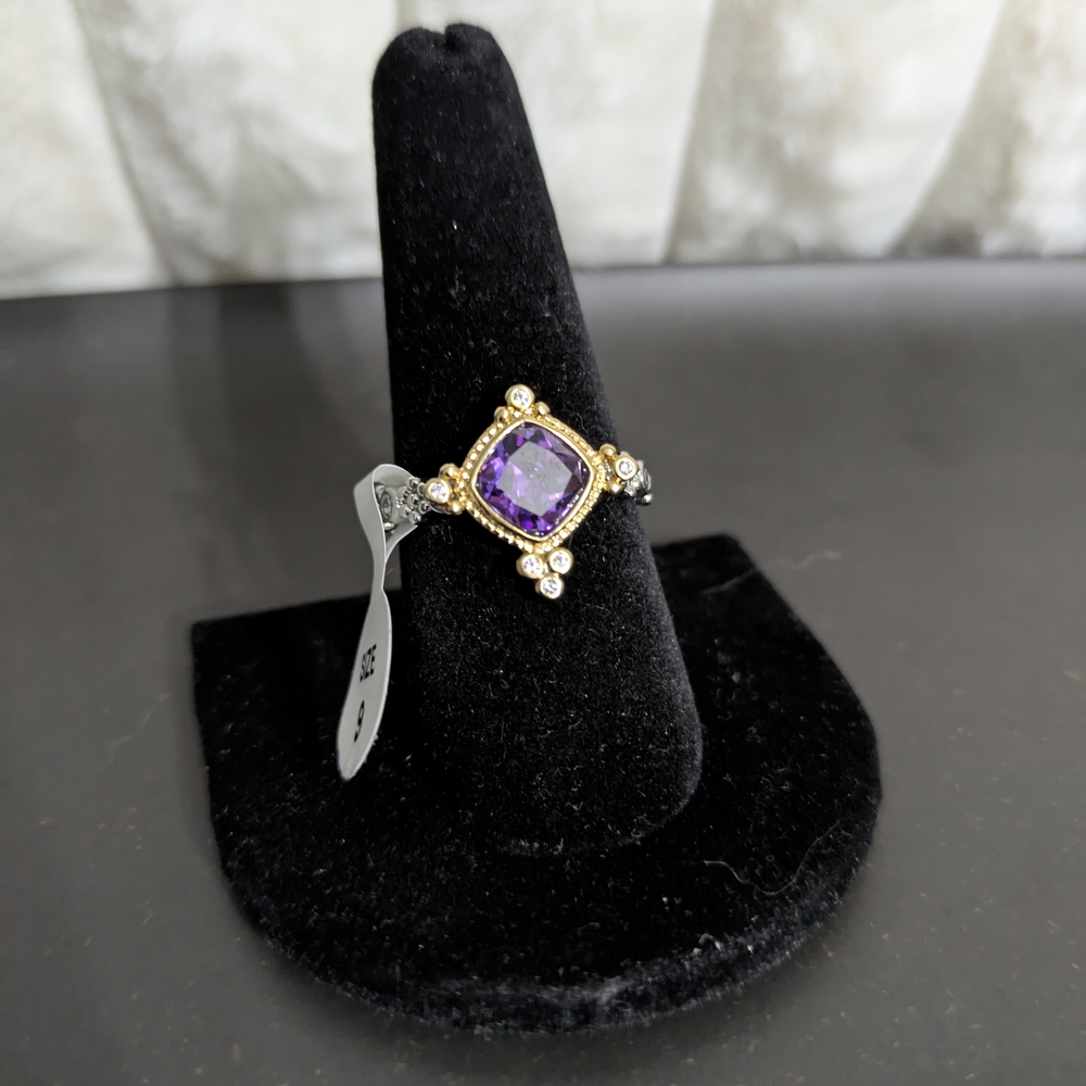 Exquisite Gold and Purple Gemstone Ring